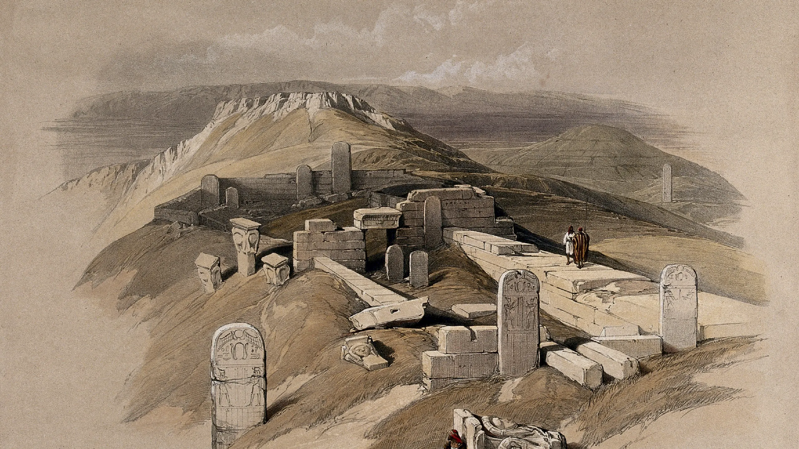 A coloured lithograph of the Egyptian ruins at Serabit el-Khadim, with inscribed stelae scattered across a hillside and two figures standing among them.